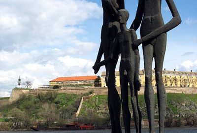 Statue of a family standing as a memorial in the city of Novi Sad