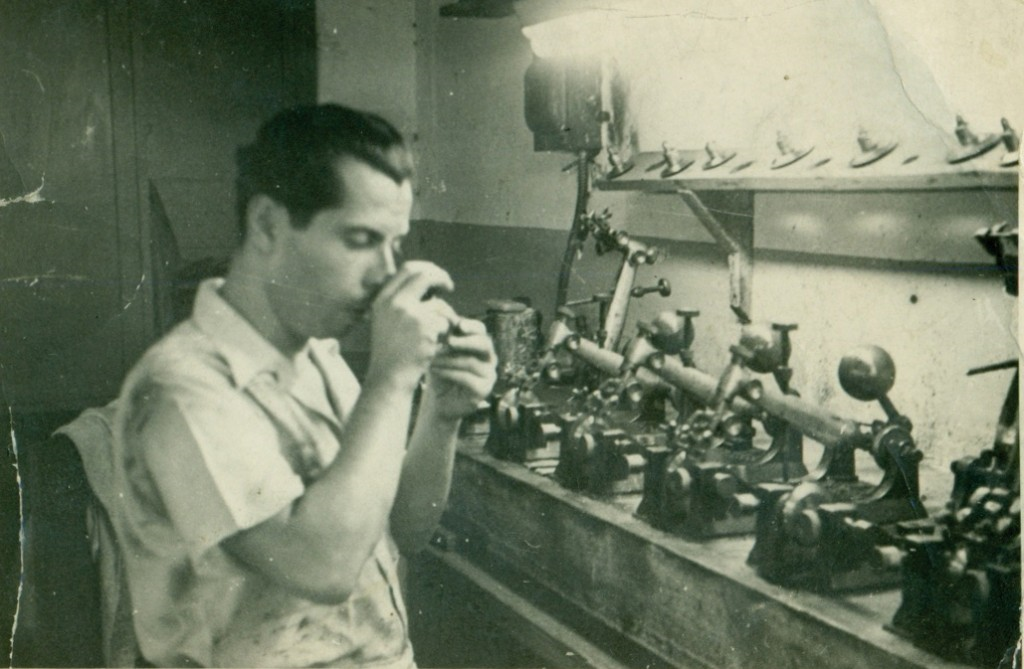 Nuchem Bodner working in a diamond factory in Cuba