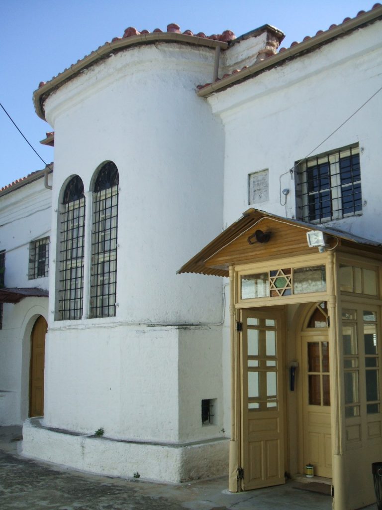 Little door leading to the synagogue of Ioannina with its barricaded windows