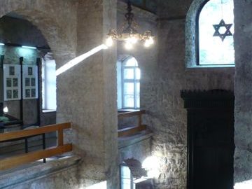 Inside view of the synagogue of Sarajevo with its tainted glass windows