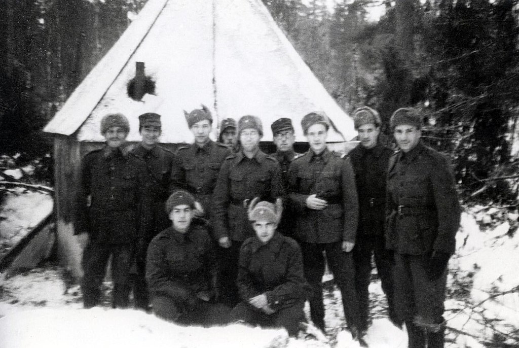 Finnish Jewish soldiers standing in front of a tent hosting a synagogue