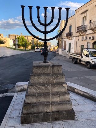 Menorah standing in a street of Puglia