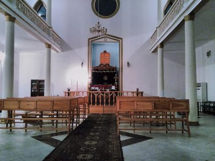 Inside the Batumi synagogue with great white walls