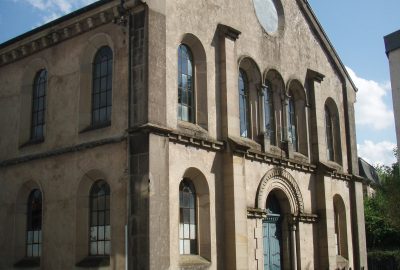 Outside view of the Montbéliard synagogue with its many windows