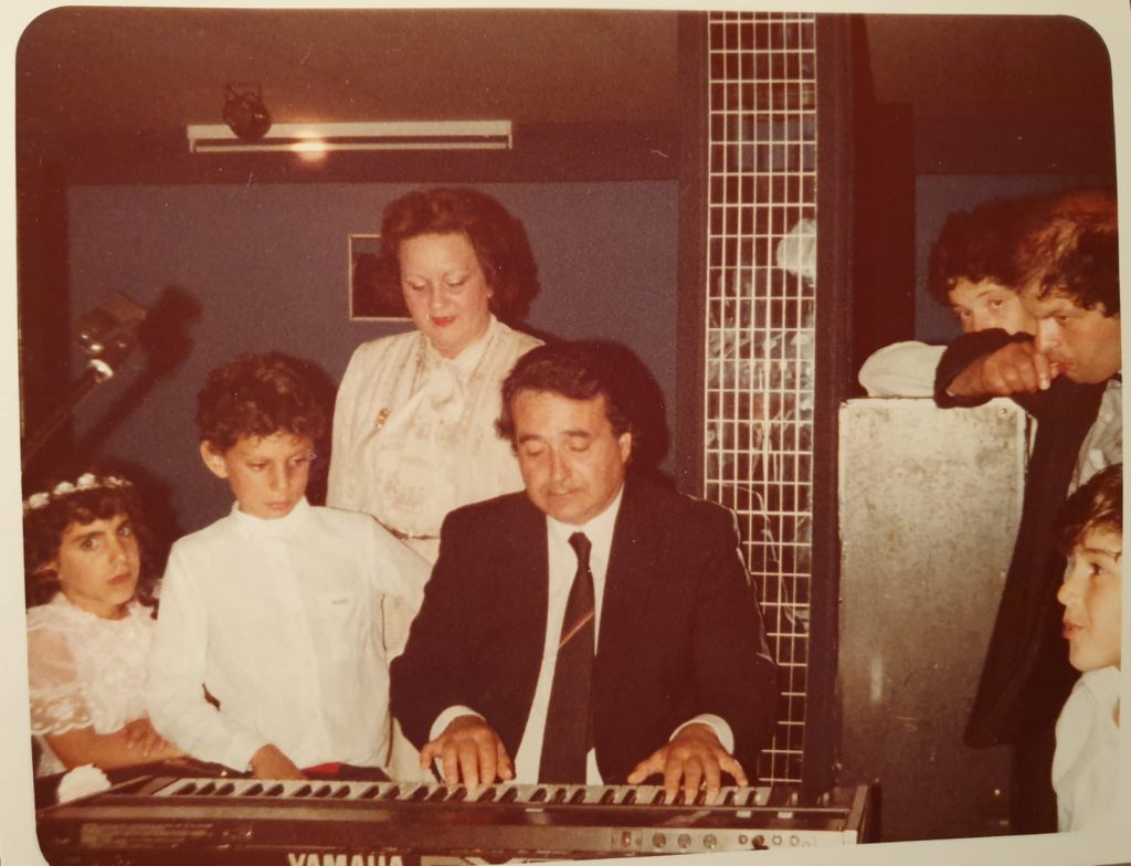 Guy Pierre Hakon playing the piano