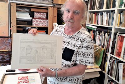 Painter Samuel Ackerman showing his work