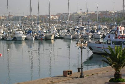 View of boats in the port of Alghero