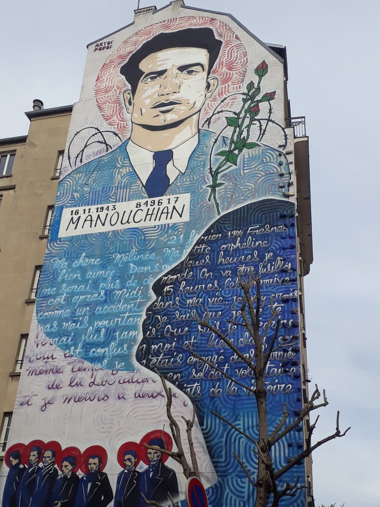 Hommage au groupe Manouchian et à son courage sur une fresque du 20e arrondissement de Paris