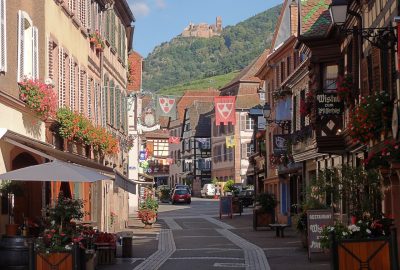 View of the streets of Ribeauvillé with the castle behind